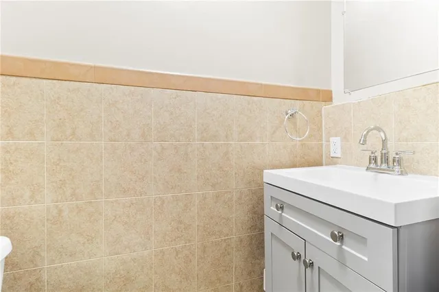 a bathroom with a sink and a shower