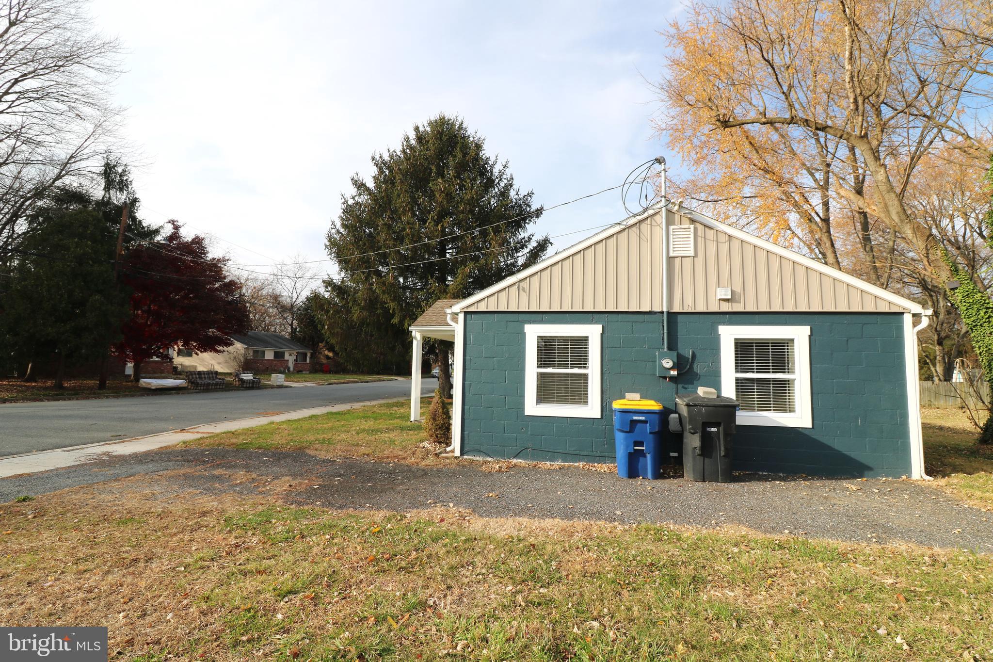143 Mitscher Road Dover, DE 19901 - Photo 22 of 25 a front view of a house with a yard and garage