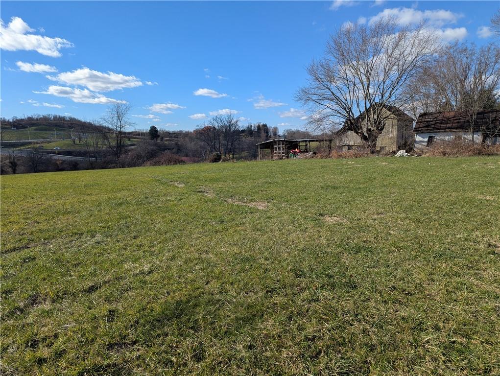 315 Telegraph Road Brownsville, PA 15417 - Photo 26 of 31 a view of a field with large trees