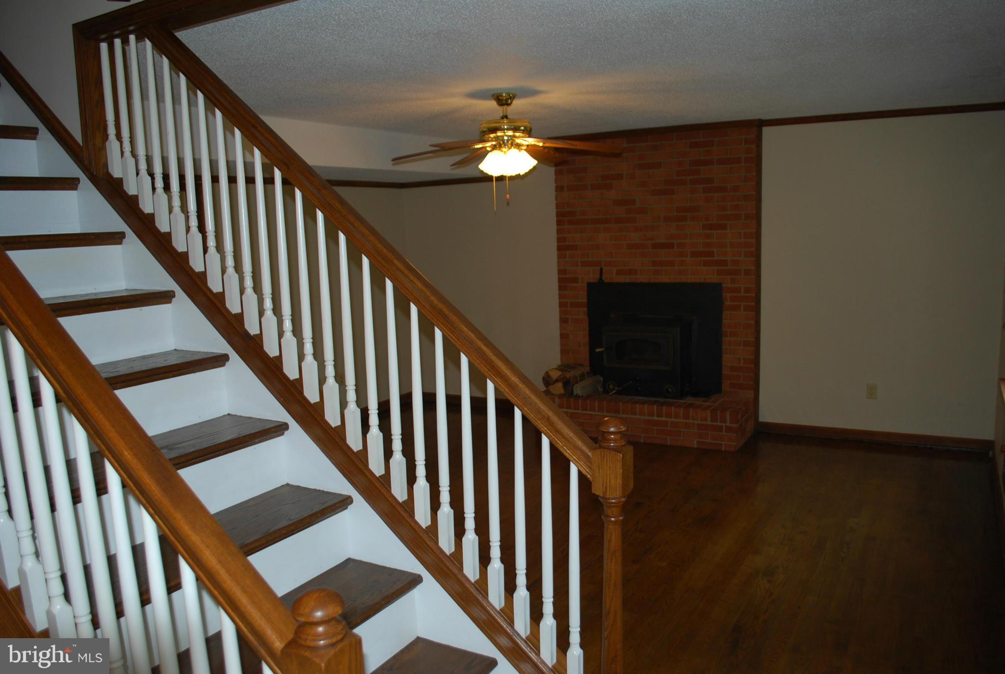 6907 Coolridge Road Temple Hills, MD 20748 - Photo 5 of 17 Entry view of stairs leading to family room