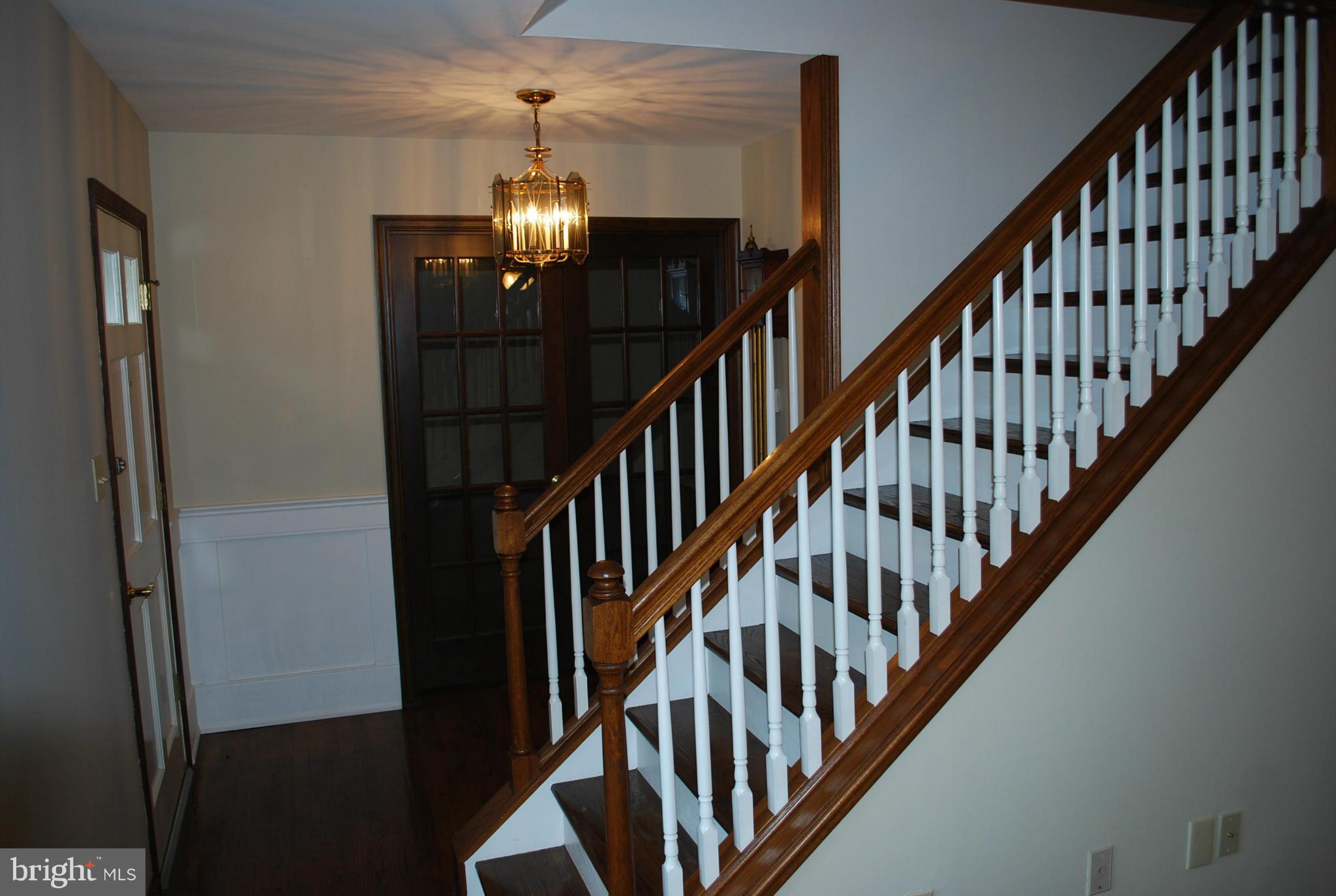 6907 Coolridge Road Temple Hills, MD 20748 - Photo 7 of 17 Entry staircase overlooking living room
