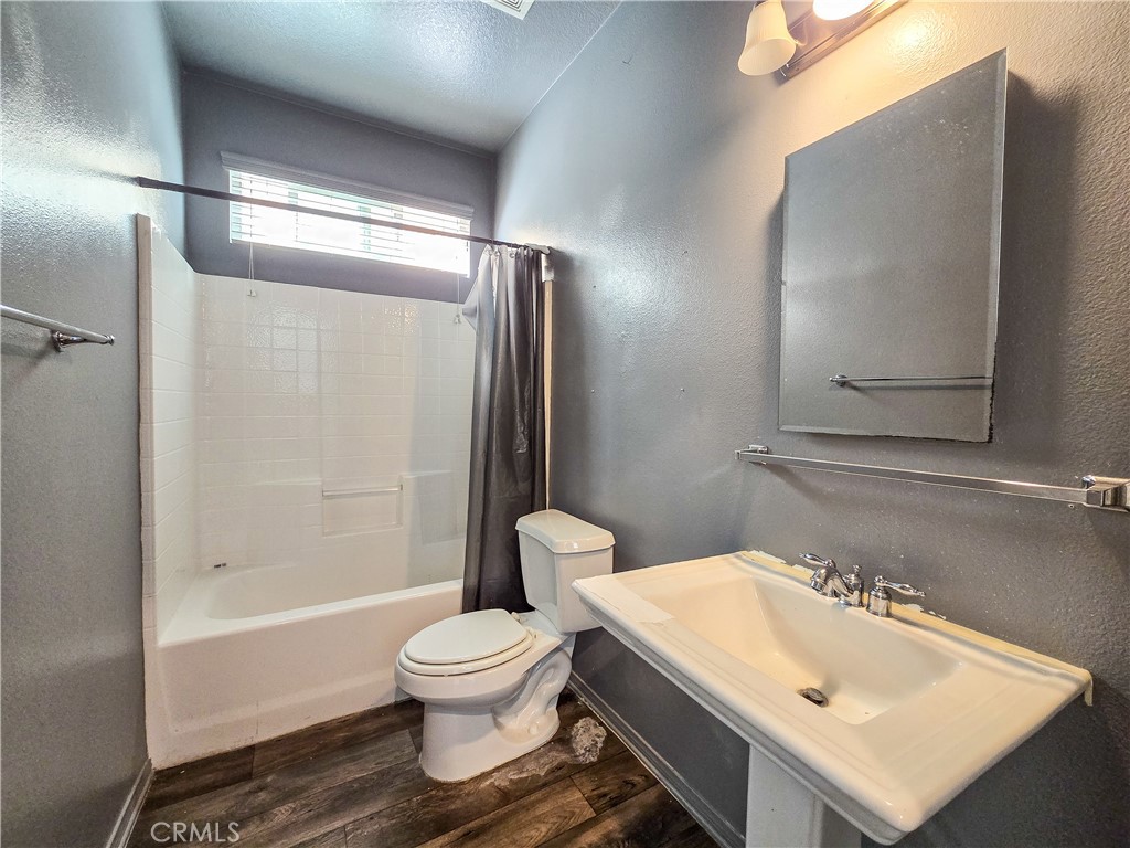 15587 Ripple Ridge Way Victorville, CA 92394 - Photo 16 of 32 downstairs bathroom