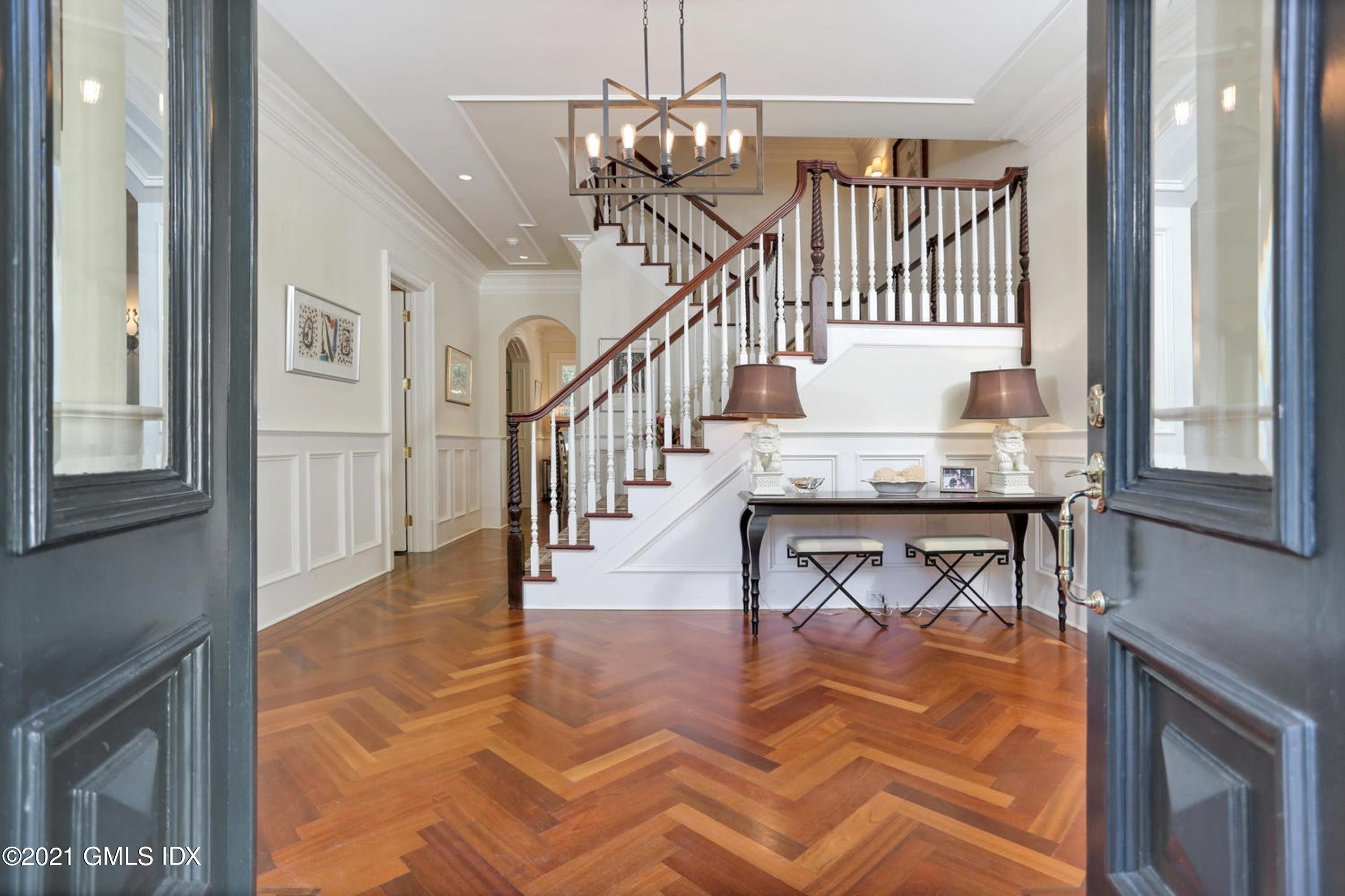 477 Riversville Road Greenwich, CT 06831 - Photo 4 of 33 a view of entryway livingroom and hall with wooden floor