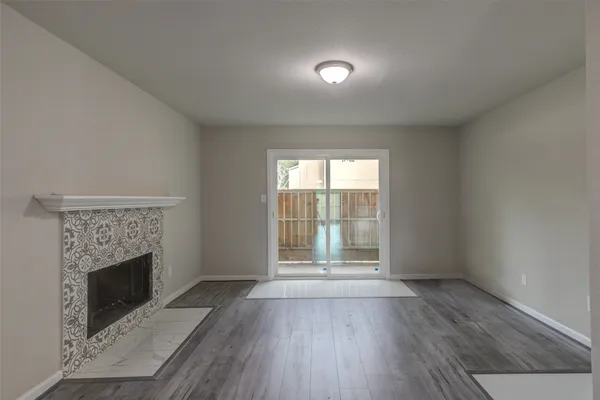 a kitchen with kitchen island a sink stainless steel appliances and cabinets