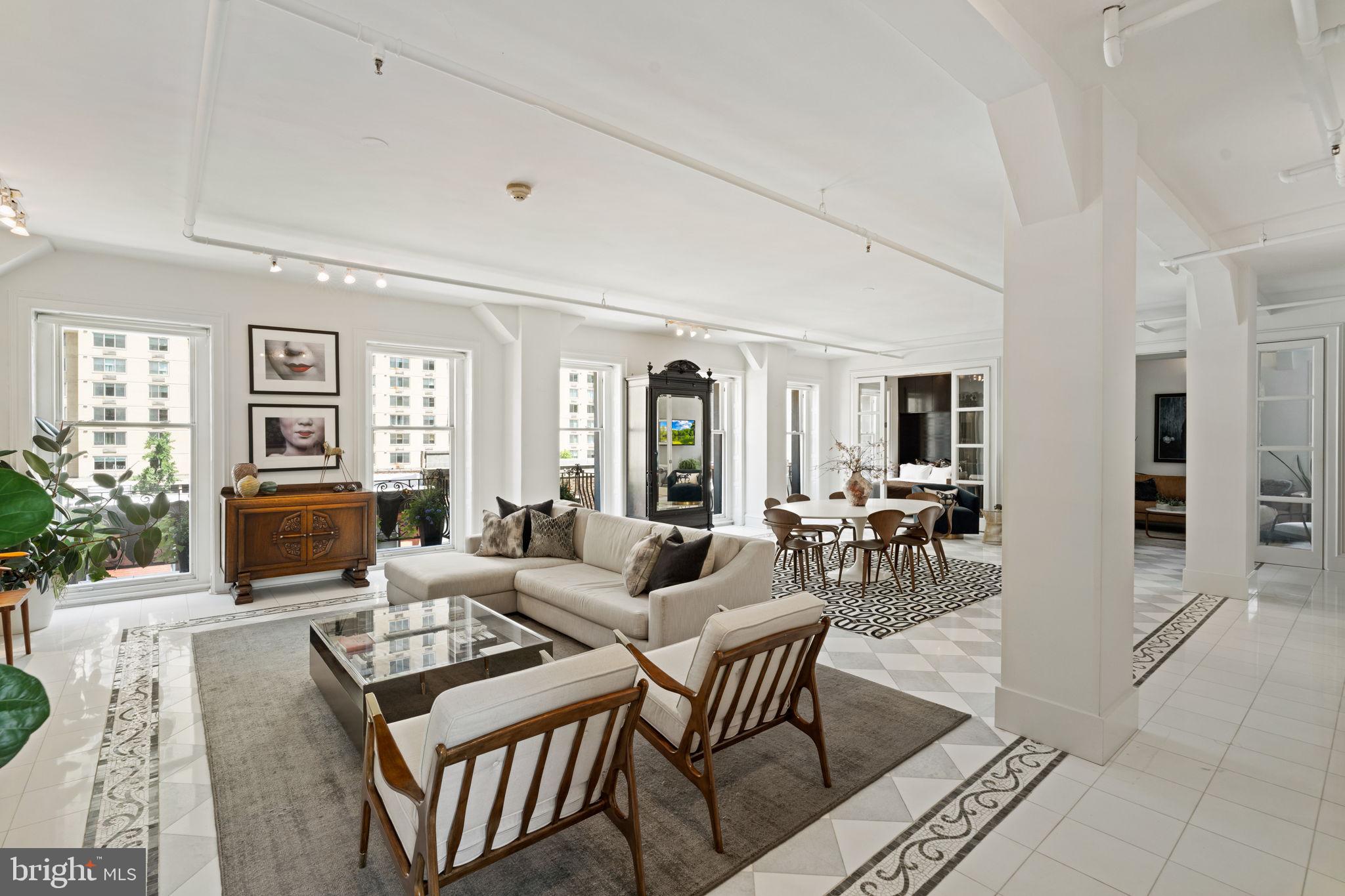 1920 Chestnut Street, Unit 5N Philadelphia, PA 19103 - Photo 12 of 33 a living room with furniture and wooden floor