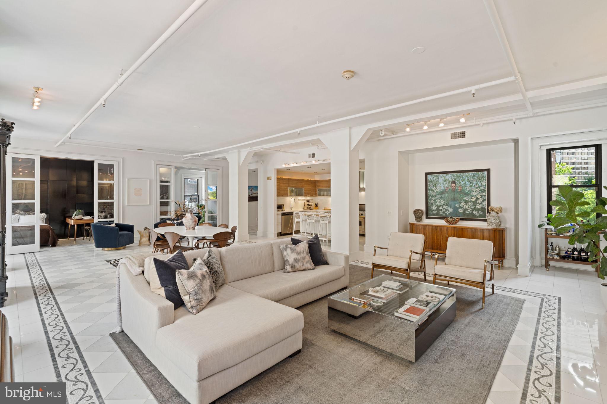 1920 Chestnut Street, Unit 5N Philadelphia, PA 19103 - Photo 14 of 33 a living room with furniture and a large window