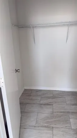 a view of small space with racks on the wall