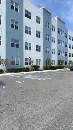 a view of street with a building in front of it
