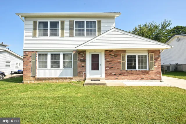 a house view with a garden space