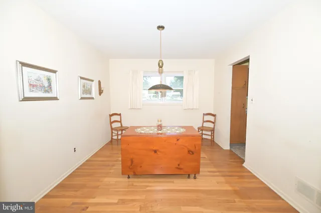 a room with table and window