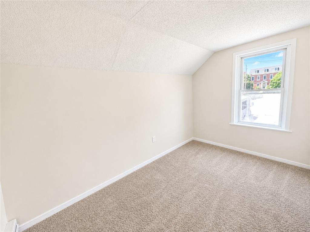 508 Riegel Street Bethlehem, PA 18018 - Photo 5 of 9 A window fills this quiet bedroom with natural light, offering a view of the neighborhood.