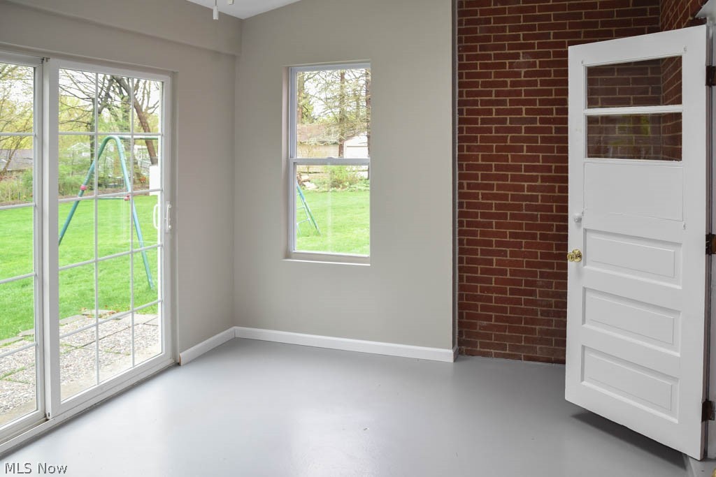 4640 Magnolia Road Northeast Canton, OH 44705 - Photo 22 of 28 The sunroom has vaulted ceilings and a skylight.