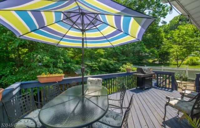 a view of balcony with furniture and stove