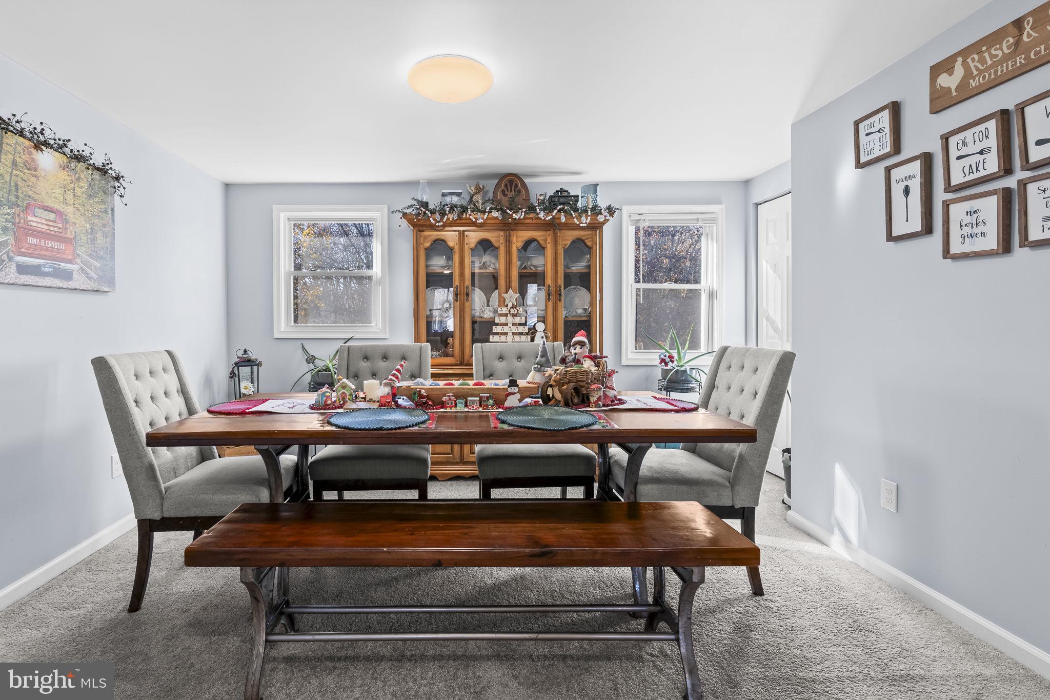 490 Clay Hammond Road Prince Frederick, MD 20678 - Photo 11 of 48 a view of a dining room with furniture
