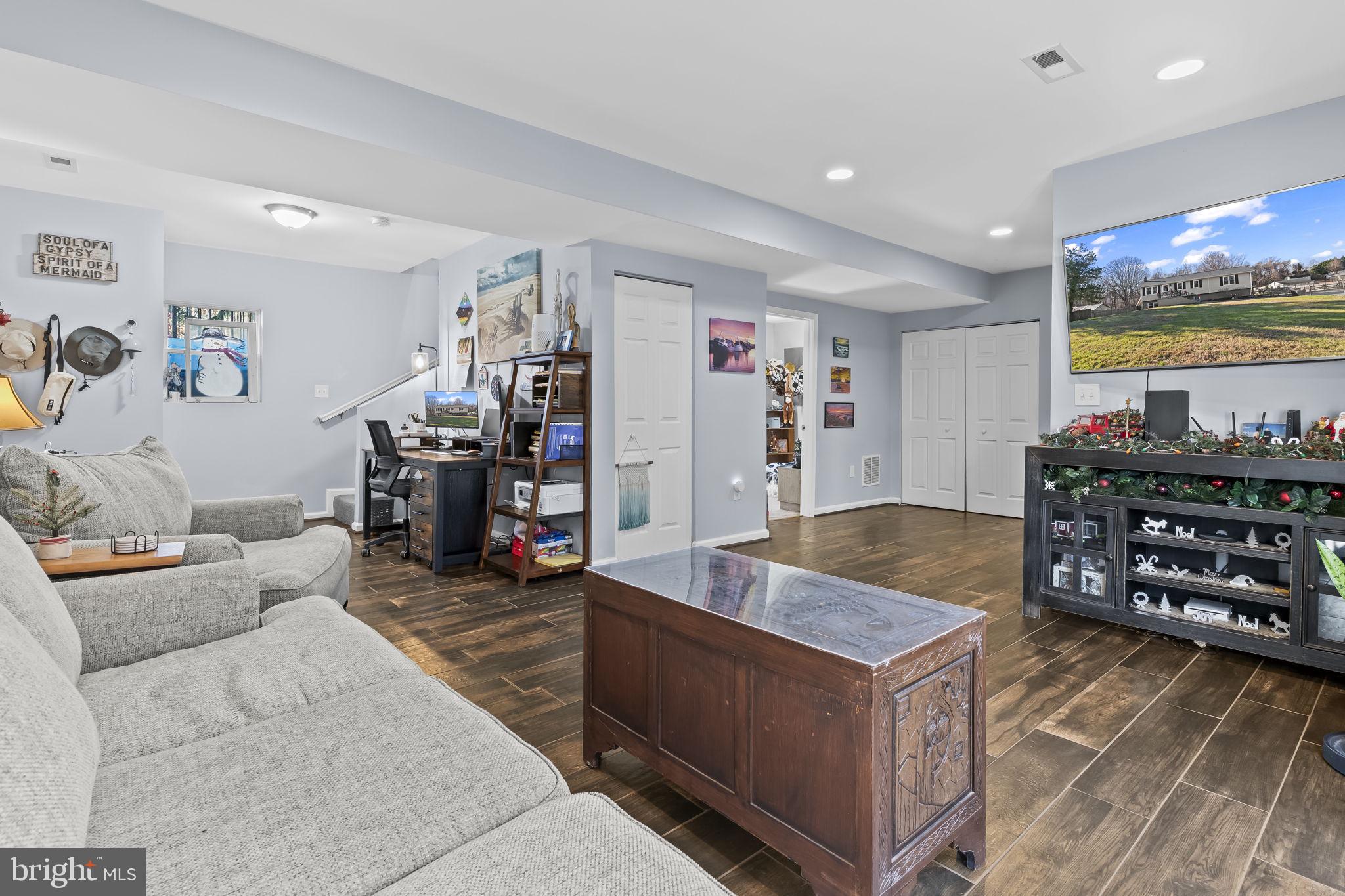 490 Clay Hammond Road Prince Frederick, MD 20678 - Photo 25 of 48 a living room with furniture and window
