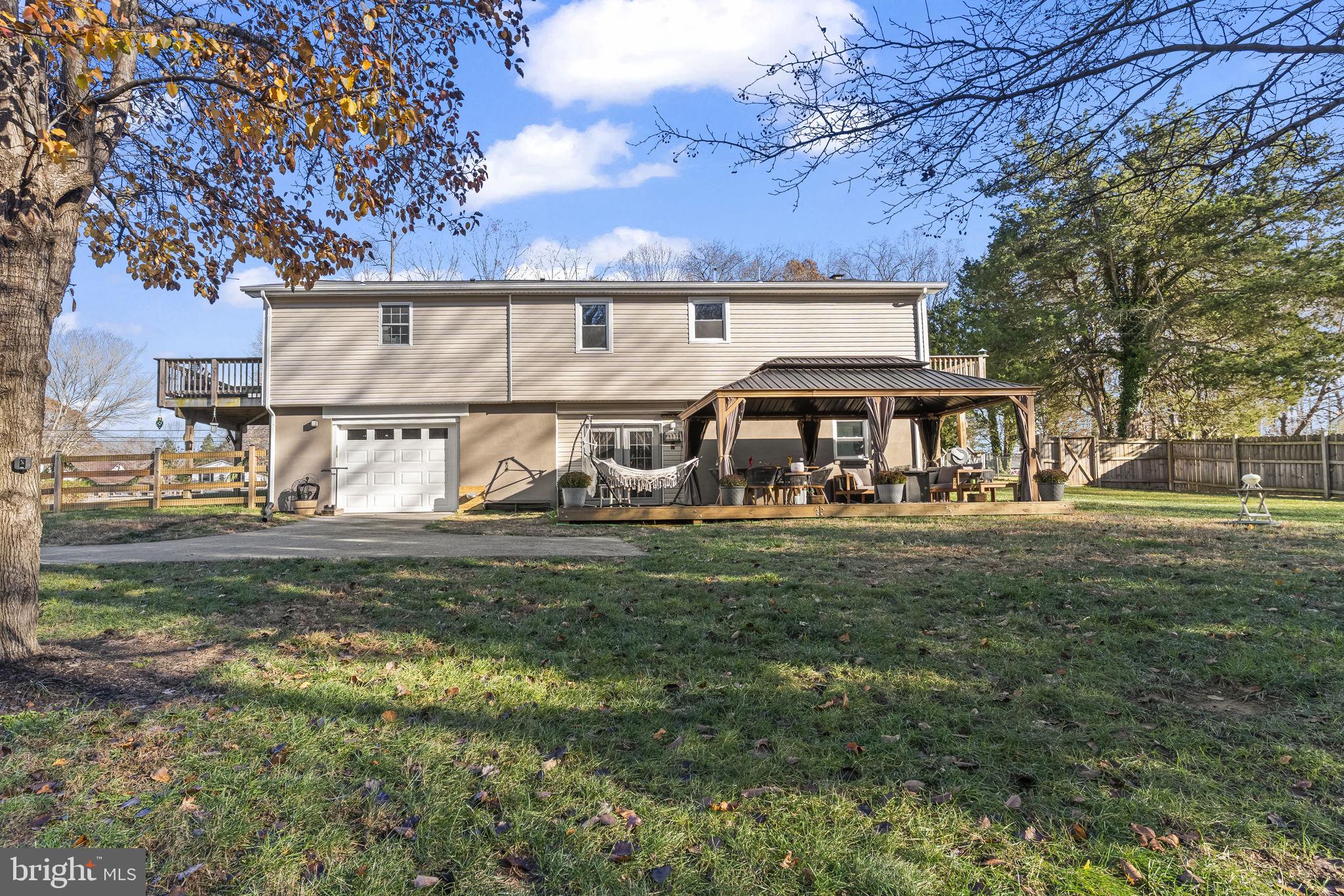 490 Clay Hammond Road Prince Frederick, MD 20678 - Photo 30 of 48 a view of a house with a yard