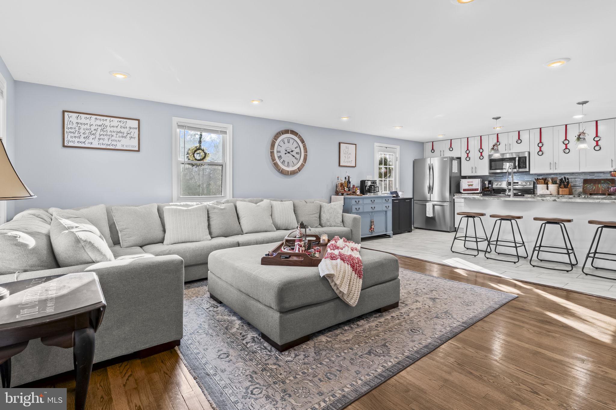 490 Clay Hammond Road Prince Frederick, MD 20678 - Photo 9 of 48 a living room with furniture and wooden floor