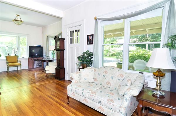 38 Middle Street Lexington, MA 02421 - Photo 6 of 30 a living room with furniture and a flat screen tv