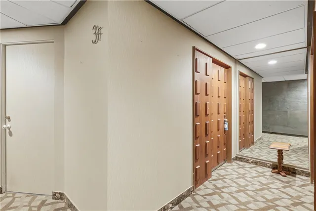 a view of a kitchen with a large window