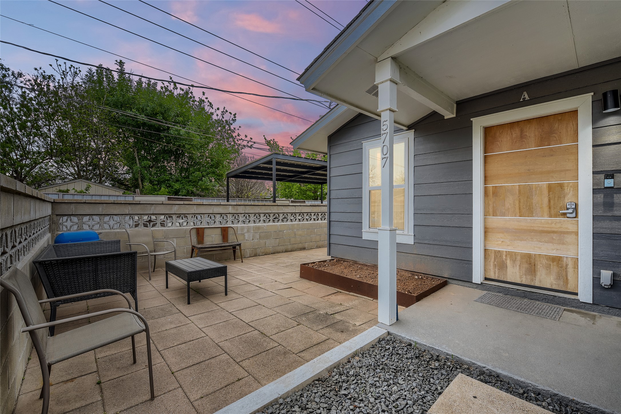 5707 Tracy Lynn Lane, Unit A Austin, TX 78721 - Photo 7 of 33 Fenced backyard with a patio