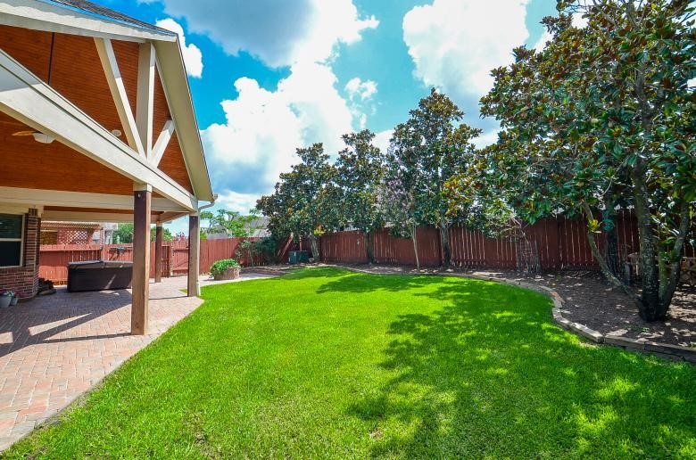 4327 Estes Ridge Lane Katy, TX 77493 - Photo 34 of 37 a view of yard with swimming pool and sitting area