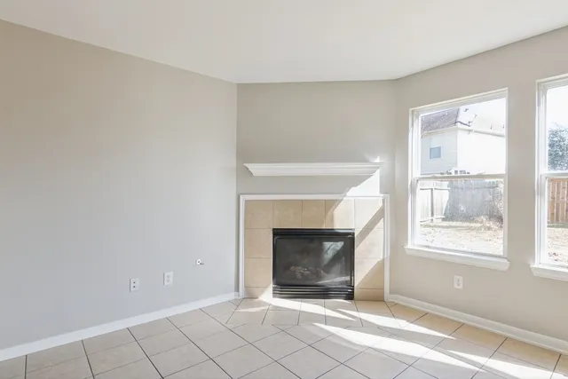 a living room with a fireplace