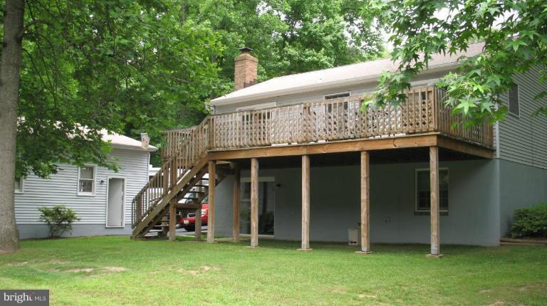 3615 Pine Tree Road Port Republic, MD 20676 - Photo 2 of 16 a view of a house with a backyard