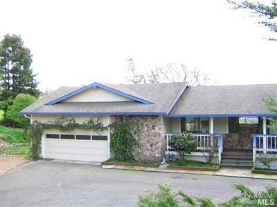 513 Grandview Road Sebastopol, CA 95472 - Photo 1 of 11 a front view of a house with garden