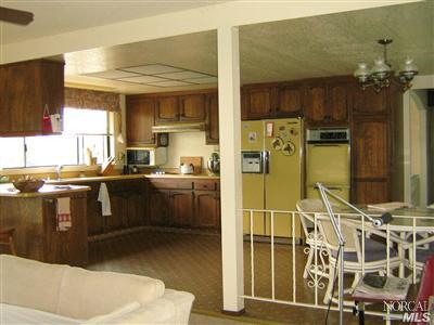 513 Grandview Road Sebastopol, CA 95472 - Photo 5 of 11 a kitchen with a sink and cabinets