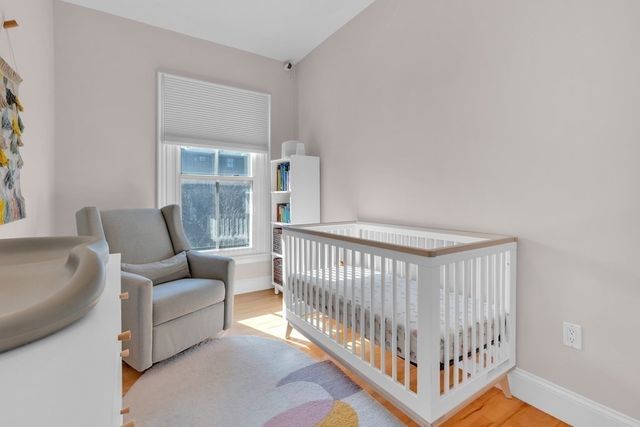 a view of a brick building with many windows