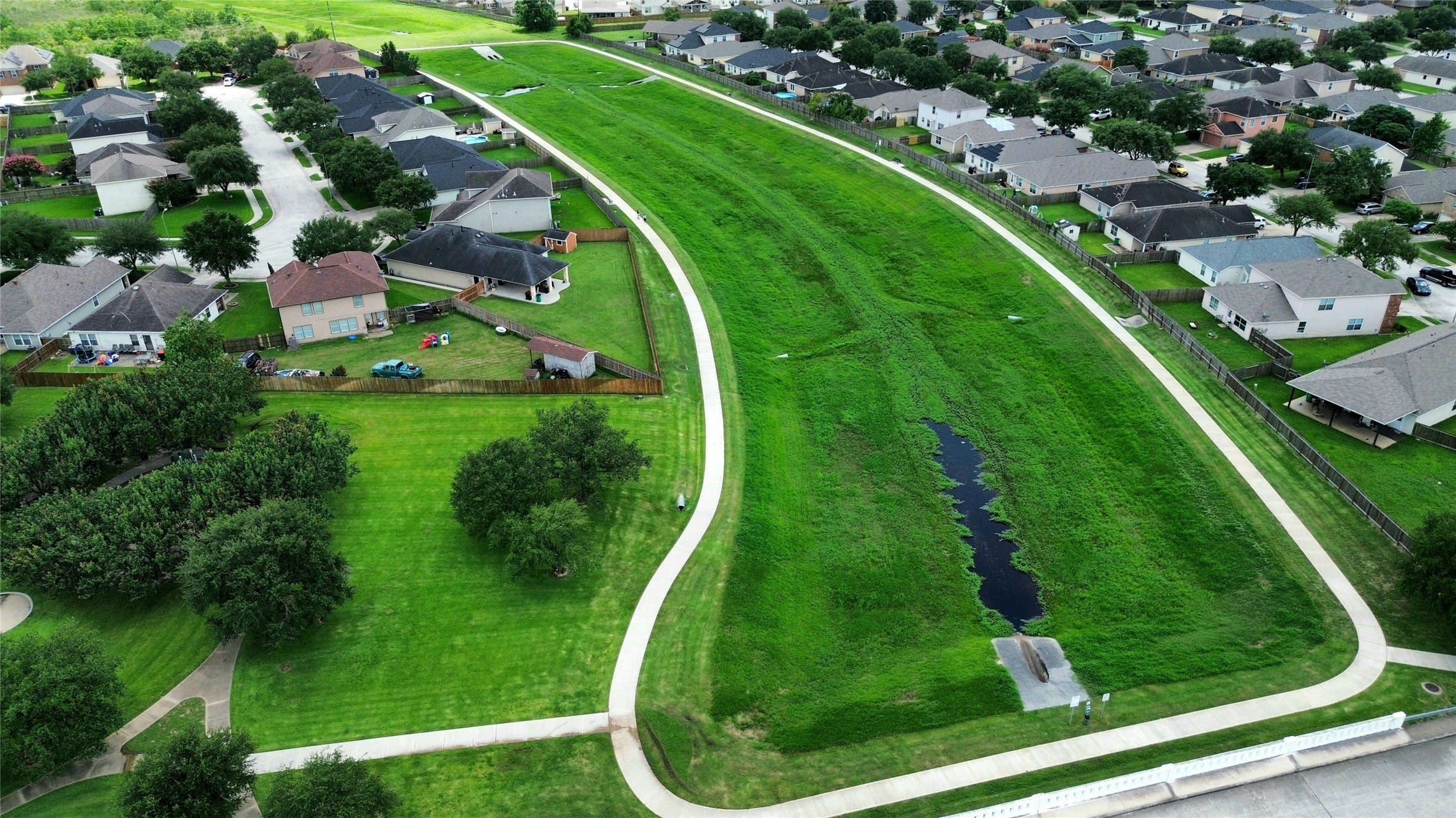 9510 Barr Spring Drive Humble, TX 77396 - Photo 27 of 27 an aerial view of a residential houses with outdoor space and trees