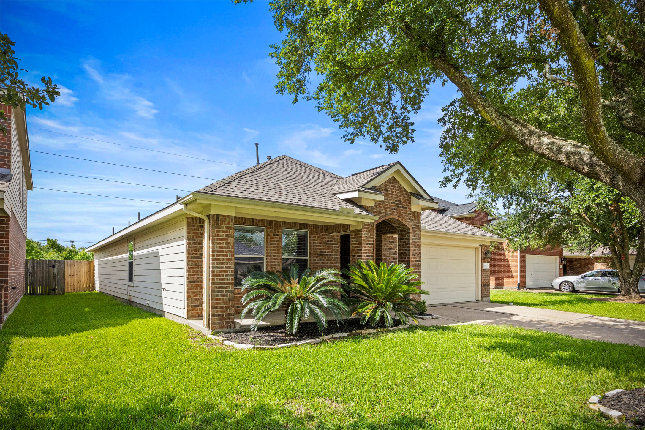 9510 Barr Spring Drive Humble, TX 77396 - Photo 3 of 27 a front view of a house with a yard