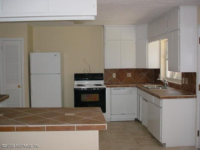 3237 Bliss Road Orange Park, FL 32065 - Photo 5 of 9 Kitchen and Breakfast Bar