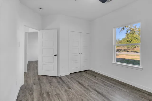 a bathroom with a sink and vanity