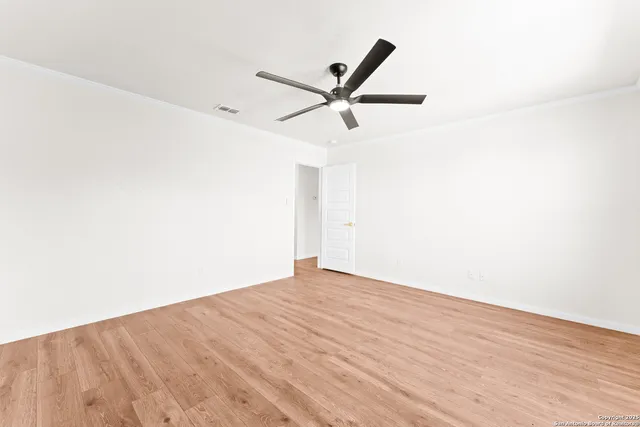 a view of a big room with wooden floor