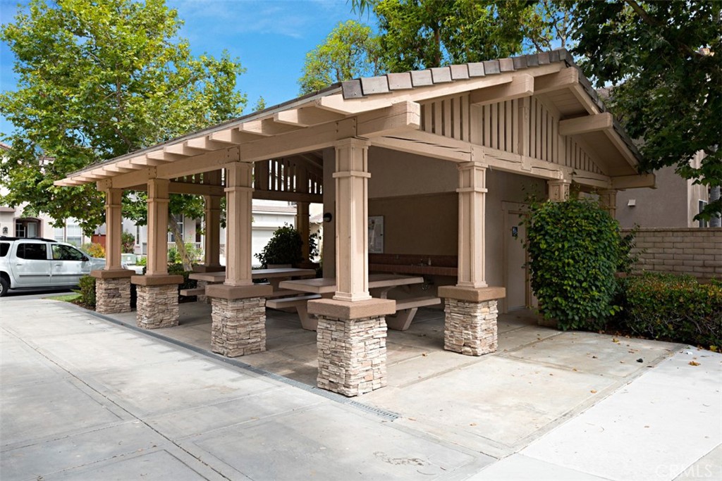 56 Acorn Ridge Rancho Santa Margarita, CA 92688 - Photo 48 of 57 Community Pavilion: Covered picnic pavilion with built-in seating and stone-accented columns provides a shaded gathering area.
