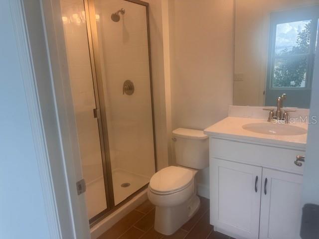 4411 Laurel Site Loop Apopka, FL 32712 - Photo 2 of 14 a bathroom with a sink a toilet and shower
