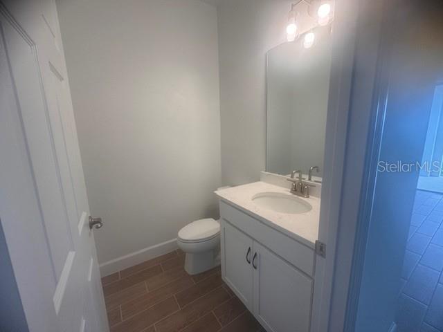 4411 Laurel Site Loop Apopka, FL 32712 - Photo 7 of 14 a bathroom with a sink and a toilet