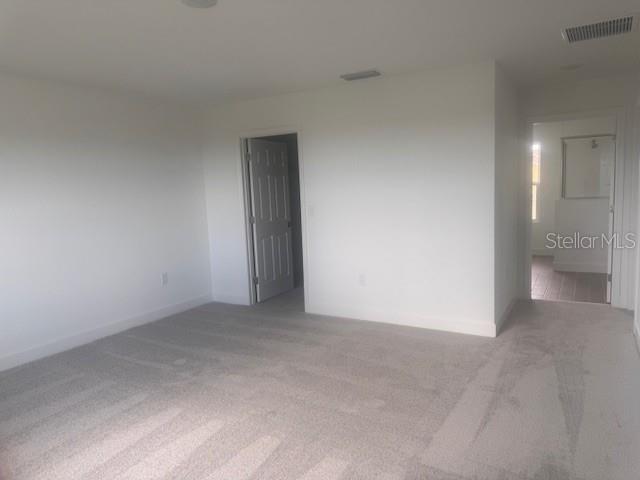 4411 Laurel Site Loop Apopka, FL 32712 - Photo 10 of 14 a view of an empty room and a bathroom