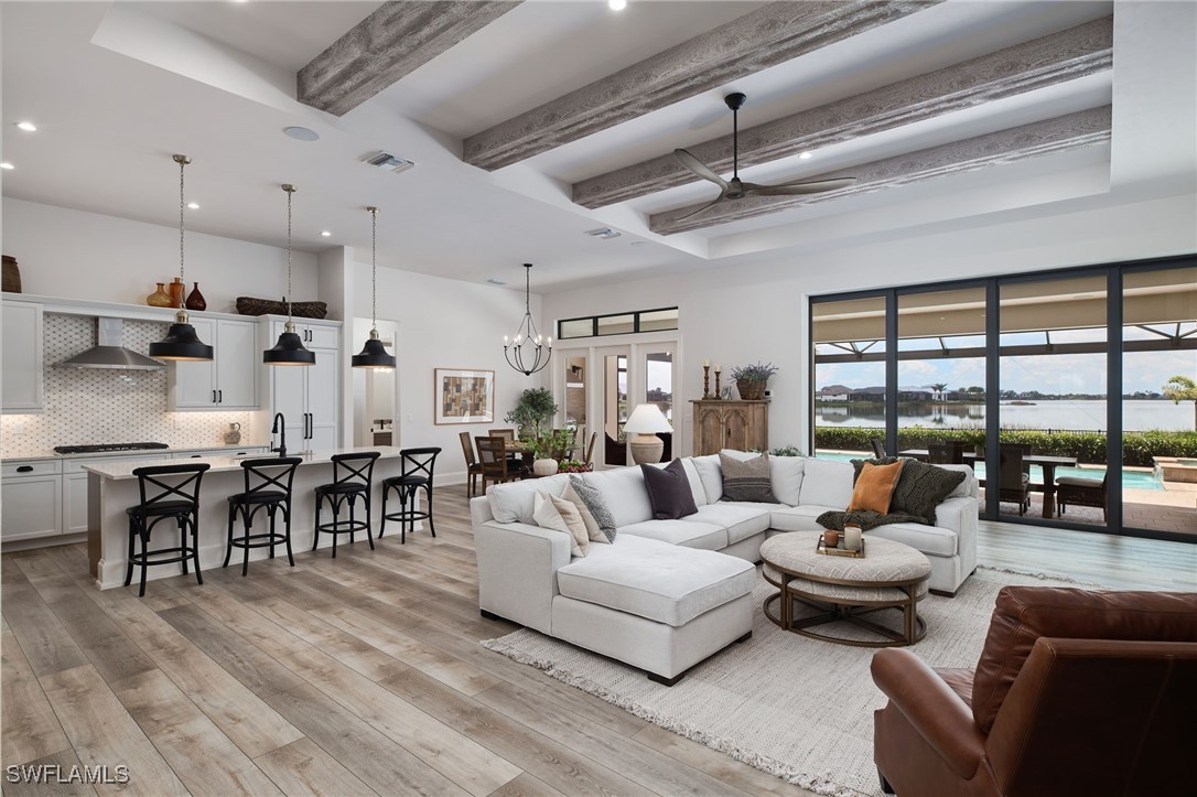 43466 Waterside Trail Punta Gorda, FL 33982 - Photo 12 of 32 a living room with furniture and a large window