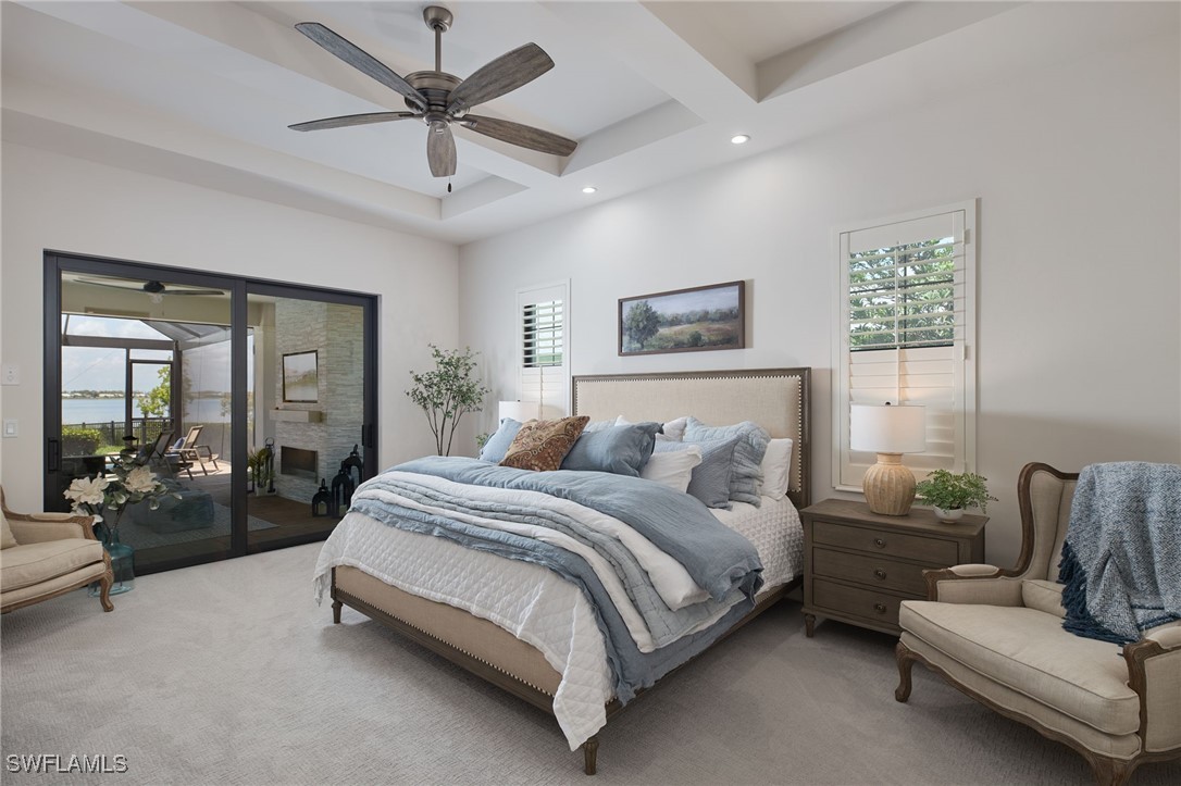 43466 Waterside Trail Punta Gorda, FL 33982 - Photo 16 of 32 a spacious bedroom with a bed and ceiling fan