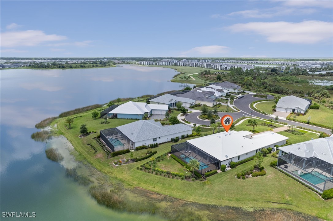 43466 Waterside Trail Punta Gorda, FL 33982 - Photo 2 of 32 an aerial view of a house with outdoor space and lake view