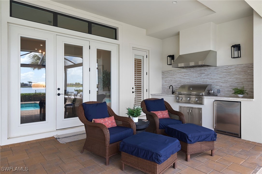 43466 Waterside Trail Punta Gorda, FL 33982 - Photo 25 of 32 a living room with furniture and a fireplace