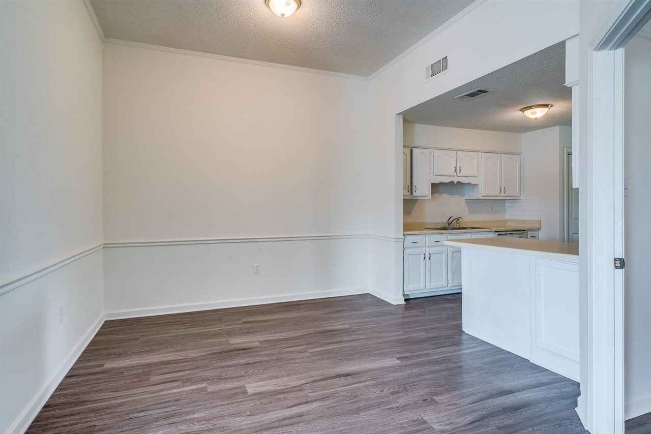 4233 Meadow Ridge Trail Memphis, TN 38141 - Photo 9 of 21 a view of a kitchen with wooden floor and a sink