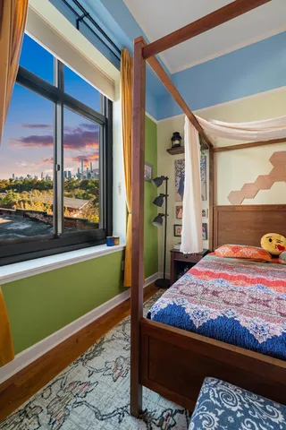 a view of a room that has a large window