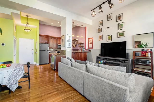 a view of a kitchen from the hallway