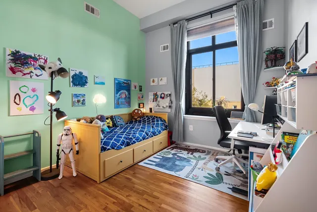 a room with a large window and front door