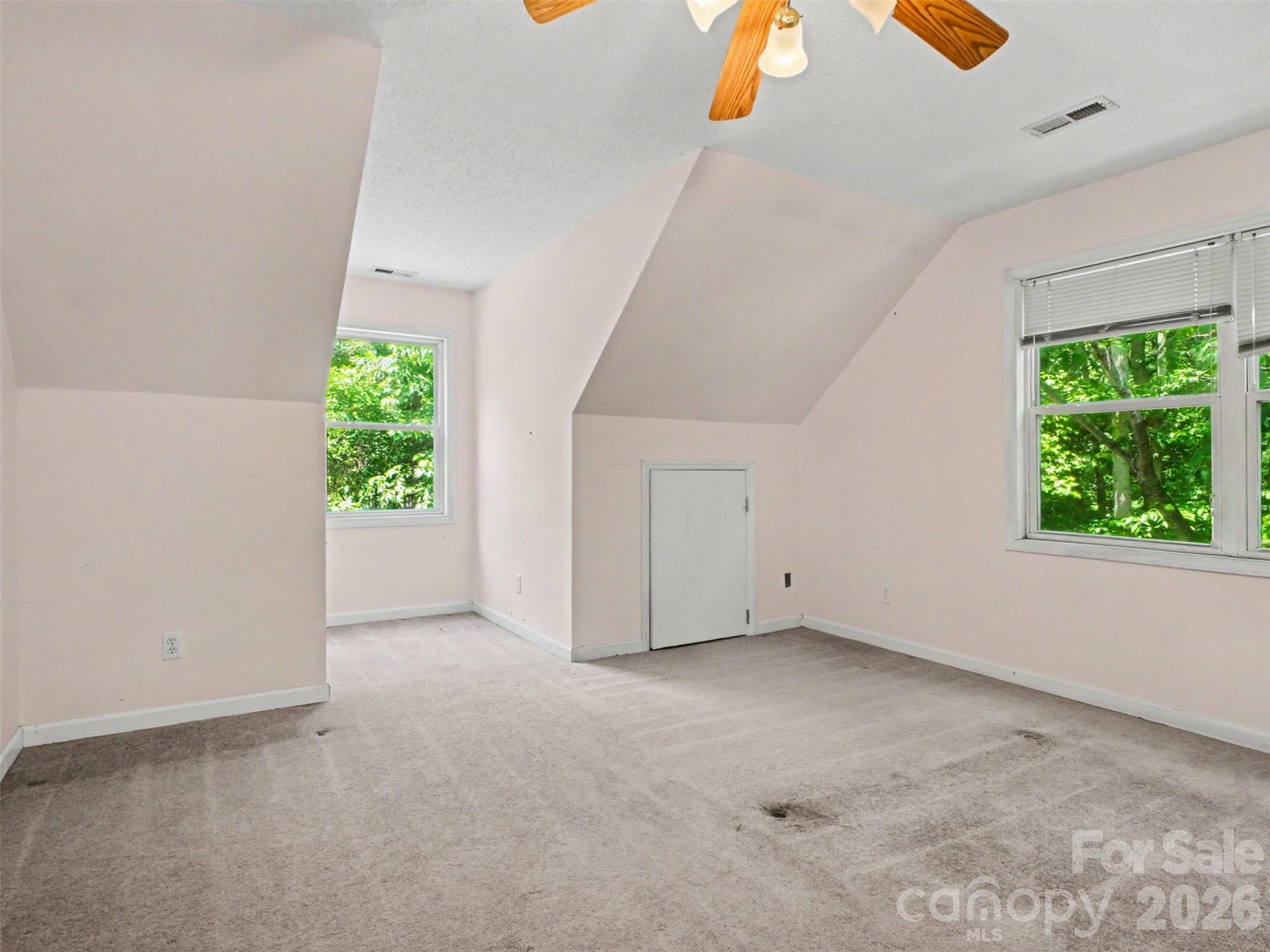 11109 Asbury Chapel Road Huntersville, NC 28078 - Photo 16 of 33 a view of an empty room with a window