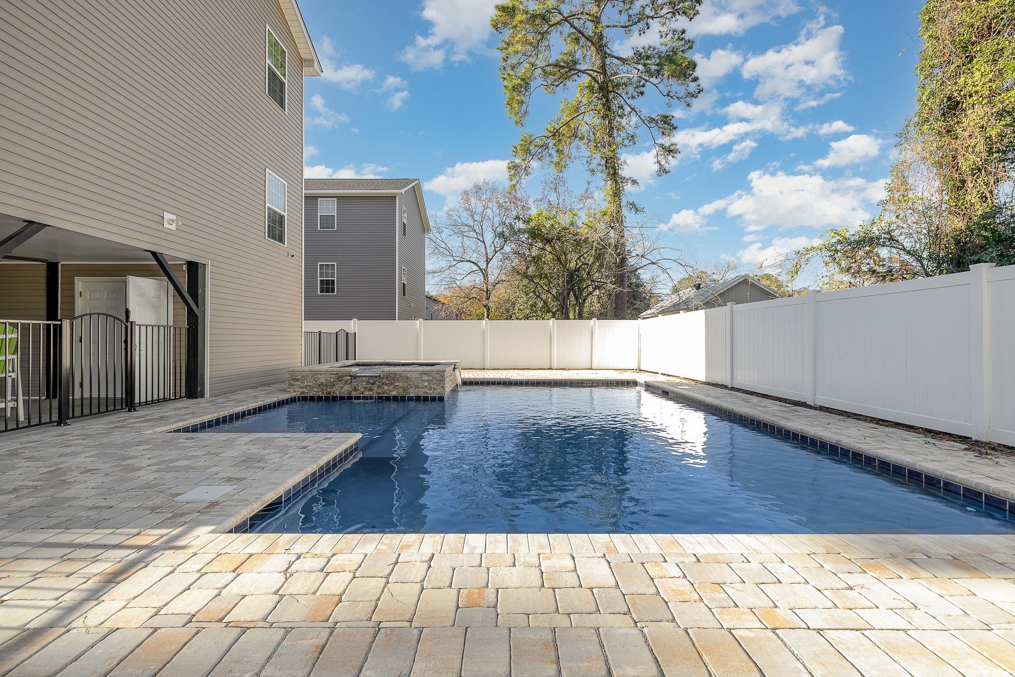618 Surfside Drive Surfside Beach, SC 29575 - Photo 32 of 40 View of pool with a patio area