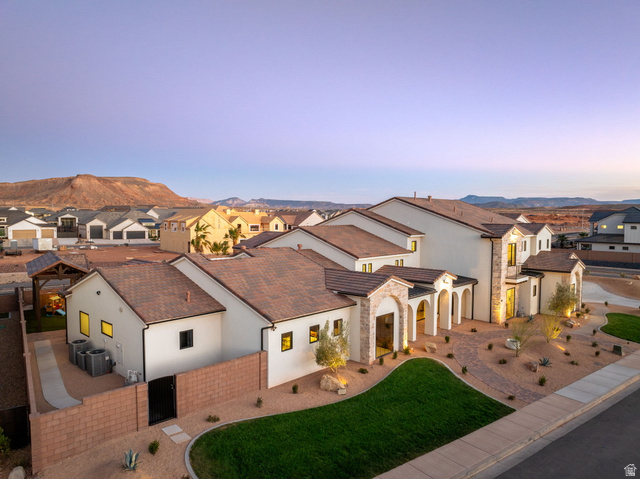 4871 South Homestead Way Washington, UT 84780 - Photo 130 of 151 Mediterranean / spanish home featuring stucco siding, a residential view, a patio, and stone siding